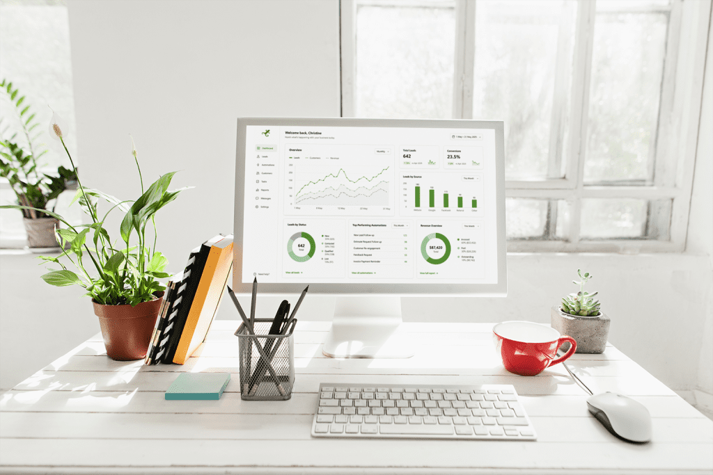 mockup-of-a-desktop-computer-placed-on-a-desk-by-an-indoor-plant-36546-r-el2